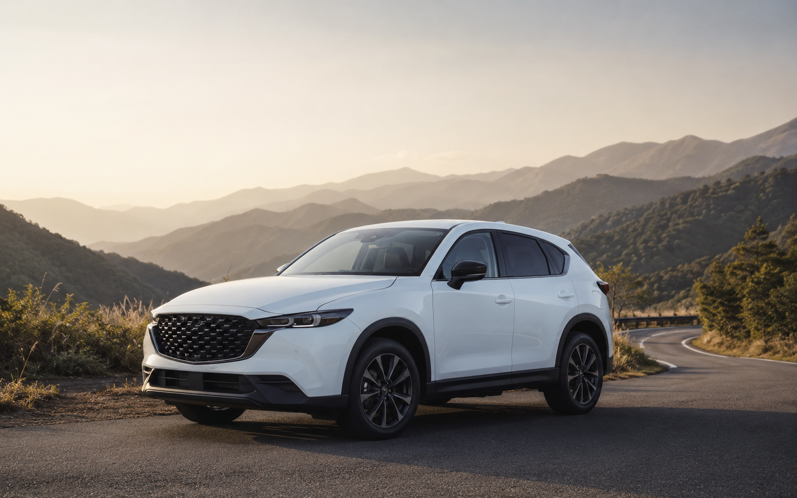 白い新型CX-5をイメージしたSUVと山道